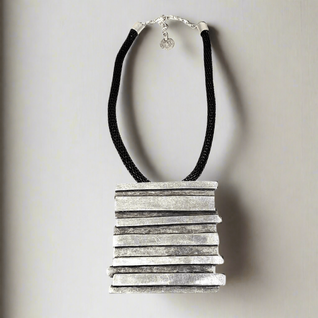 Artisan pewter necklace with leather and silver plating
Unique handmade pewter necklace with leather strap
925 silver-plated pewter pendant necklace
Elegant pewter necklace with genuine leather
Handcrafted pewter and leather necklace for men/women
High-quality pewter necklace with silver plating
Custom handmade pewter necklace with leather cord
Pewter necklace with silver-plated finish and leather
Premium leather and pewter necklace with 925 silver
Vintage-style pewter necklace with leather and silver
