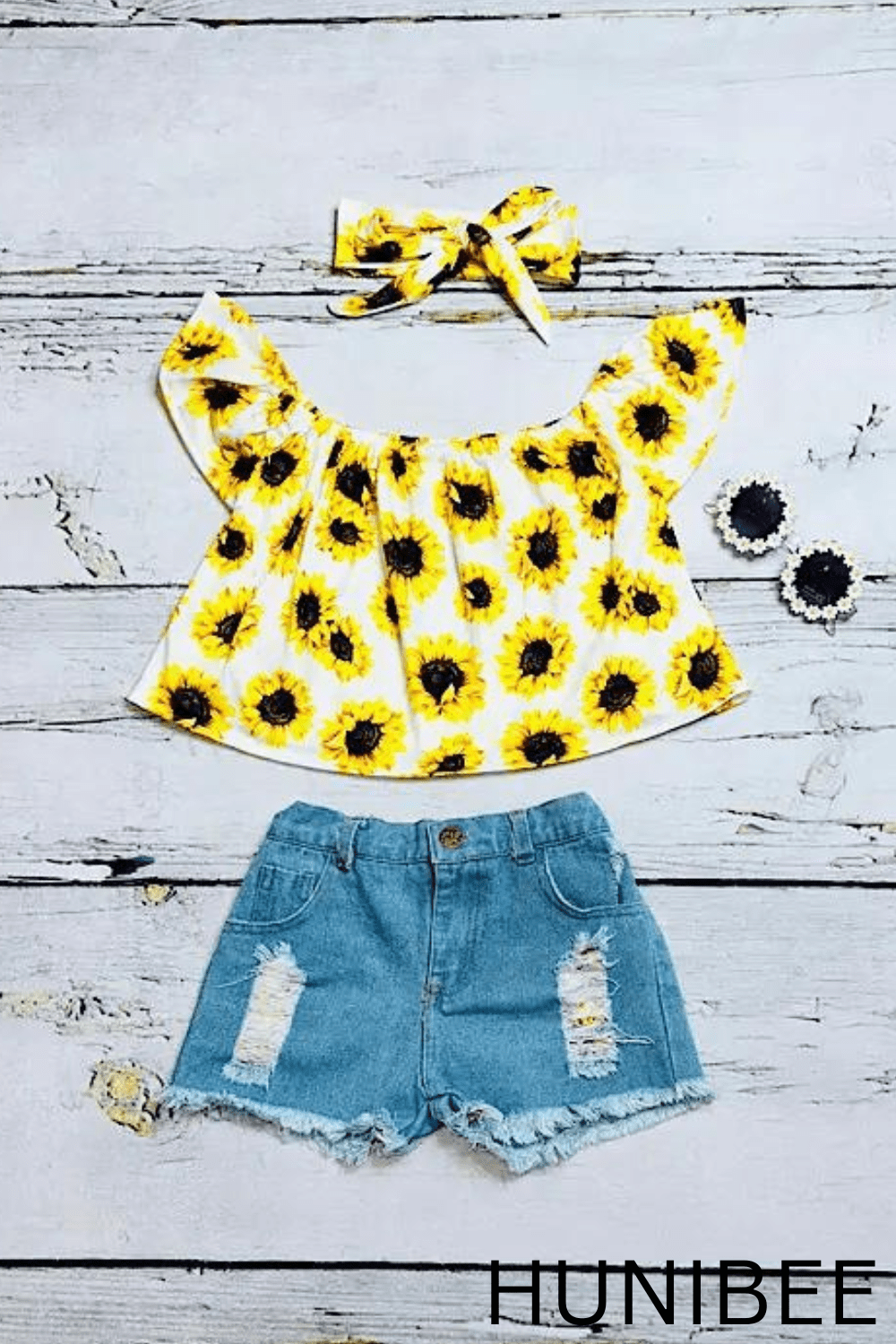 Let Your Little One Shine in Our Sunflowers Off-the-Shoulder Top and Denim Shorts - A Stylish 3-Piece Set for Trendy Kids! Discover Now at HuniBee Boutique.