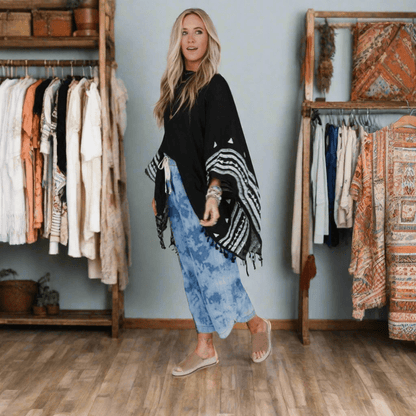 Embroidered boho poncho for women
Black poncho for women with unique embroidery
Embroidered women's poncho for boho style lovers
Lightweight embroidered poncho top for all seasons
Women's embroidered sleeve poncho for effortless style
Black tassel poncho for stylish casual outfits