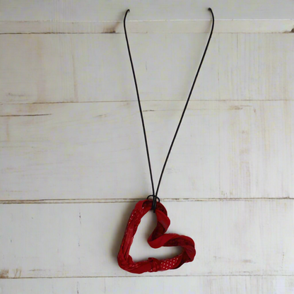 Handmade rustic heart necklace in red Artisan crafted red heart necklace Unique handmade heart pendant necklace Custom made rustic heart jewelry Red heart pendant necklace handmade Handcrafted red heart charm necklace Red rustic heart necklace for women