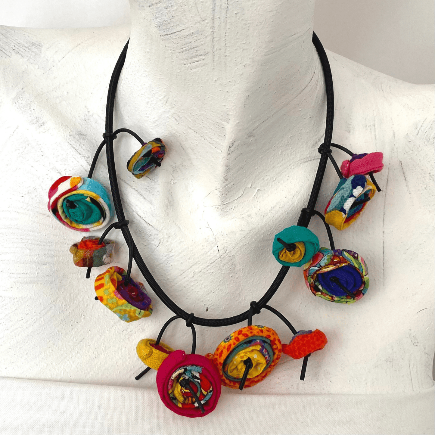 Handmade colorful string necklace Unique black and white necklace for women Artisan beaded necklace for boho style Bold statement necklace for fashion-forward women Handcrafted necklace with artistic design Queen of String colorful necklace Fashionable black and white necklace for casual wear Handmade artistic jewelry for women Unique bohemian necklace with colorful beads Handcrafted necklace for artistic fashion