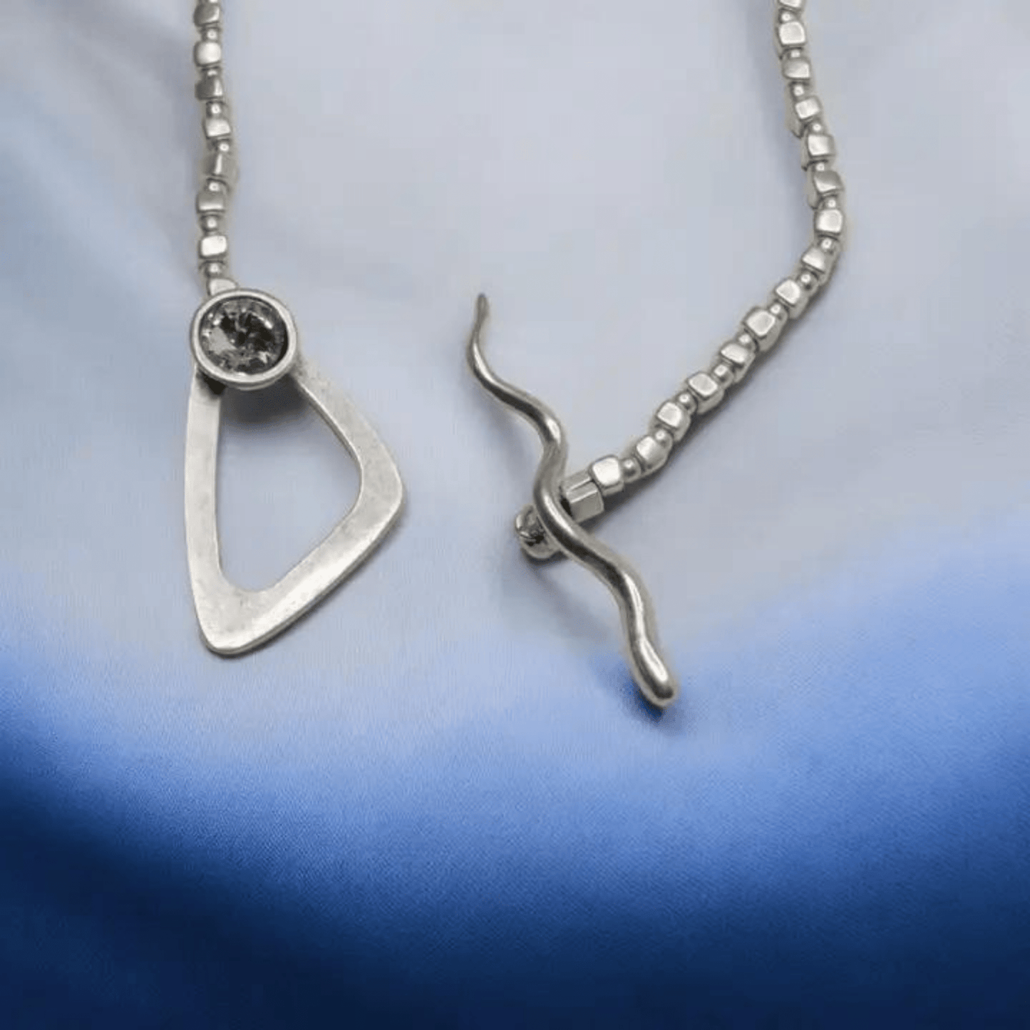Custom handmade pewter necklace with leather cord
Pewter necklace with silver-plated finish and leather
Premium leather and pewter necklace with 925 silver
Vintage-style pewter necklace with leather and silver
Durable pewter pendant necklace with silver plating
Designer pewter necklace with leather and 925 silver
