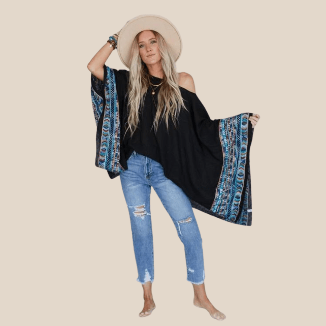 Poncho tunic top for relaxed and comfortable styling
Festival-ready poncho top for a bold statement
Loose poncho top for easy, breezy fashion
