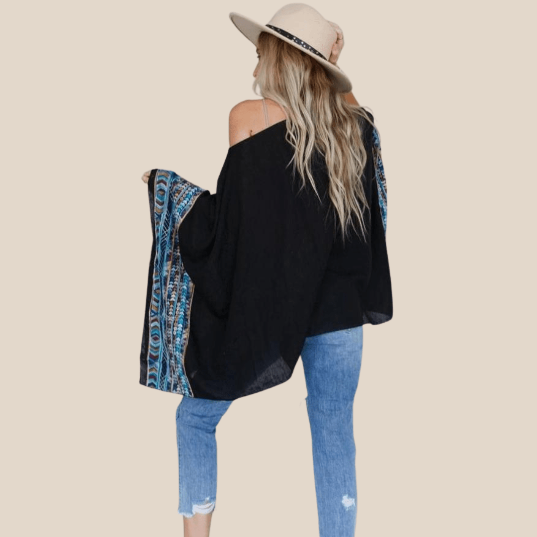 Trendy boho poncho for festivals and events
Poncho top with relaxed fit for comfort
Poncho cover-up for beach or poolside
Versatile poncho top for casual or dressy occasions
Women's poncho top with loose and comfortable fit
Poncho top for layering with jeans or leggings