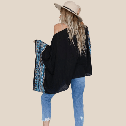 Trendy boho poncho for festivals and events
Poncho top with relaxed fit for comfort
Poncho cover-up for beach or poolside
Versatile poncho top for casual or dressy occasions
Women's poncho top with loose and comfortable fit
Poncho top for layering with jeans or leggings
